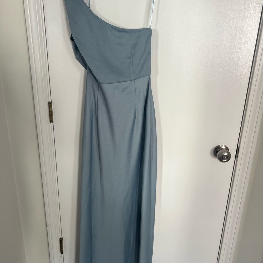 New with tags BHLDN size 6 bridesmaid dress. Color Dusty Blue.